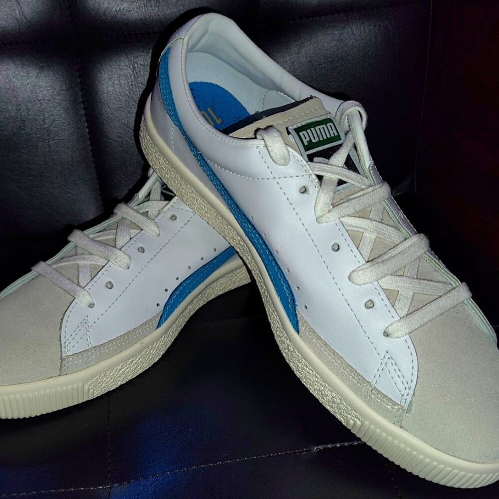Brand new Puma sneakers...never been worn. Size 10.5